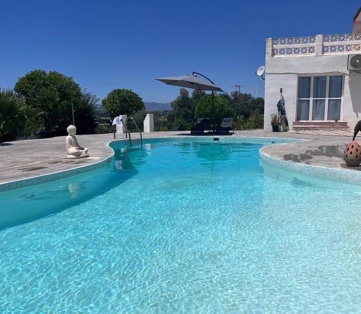 Casa de vacaciones para 12 personas, con Balcón y Jardín en Cártama