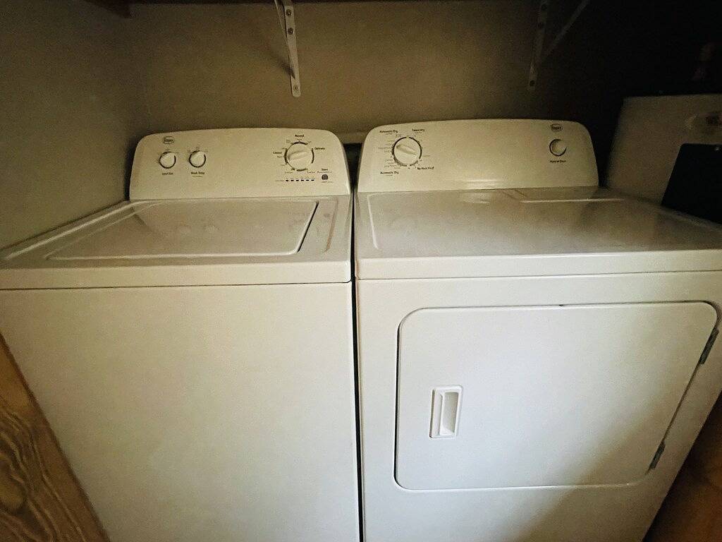 Downtown by Chattahoochee River, sit on front porch as horse and buggy stroll by in Helen, Chattahoochee National Forest