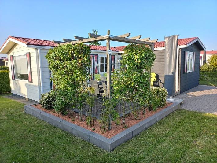 Vakantiewoning voor 5 personen, met Terras en Tuin in Serooskerke