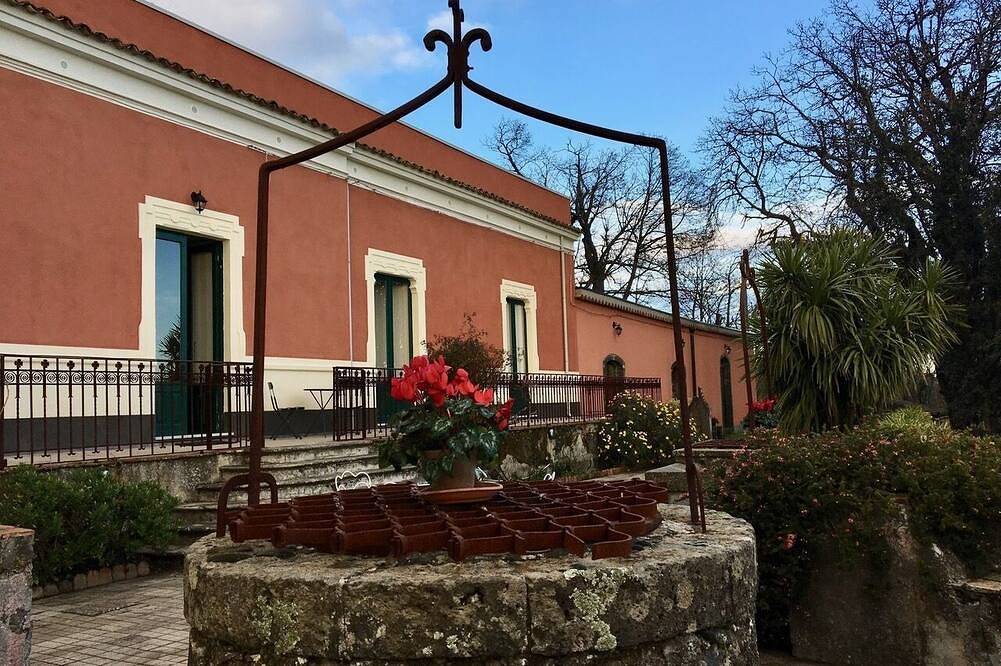 Typical charming villa surrounded by nature and old trees in Milo, Mount Etna