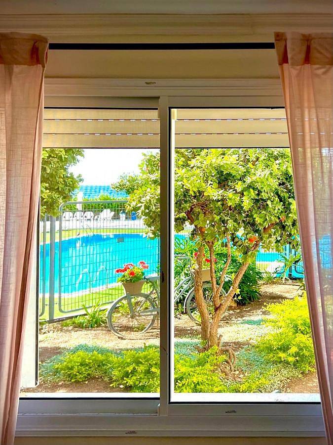 Appartement de vacances pour 2 personnes, avec terrasse ainsi que jardin et piscine
