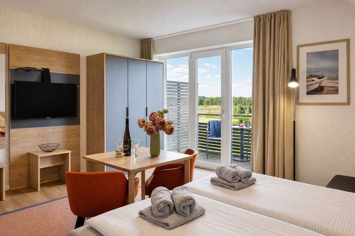Ferienwohnung für 3 Personen, mit Balkon und Garten sowie Ausblick in Wreechen