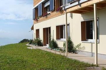 Ferienwohnung für 4 Personen, mit Ausblick und Garten sowie Seeblick am Vierwaldstättersee