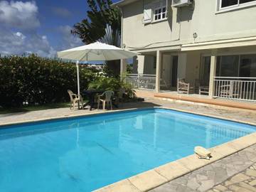Gîte pour 7 personnes, avec vue ainsi que piscine et jardin dans Plage de l’Anse Vinaigri