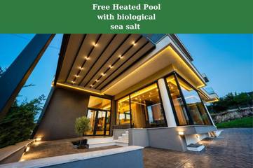 Cottage pour 2 personnes, avec sauna et vue ainsi que jardin et piscine dans Stavros