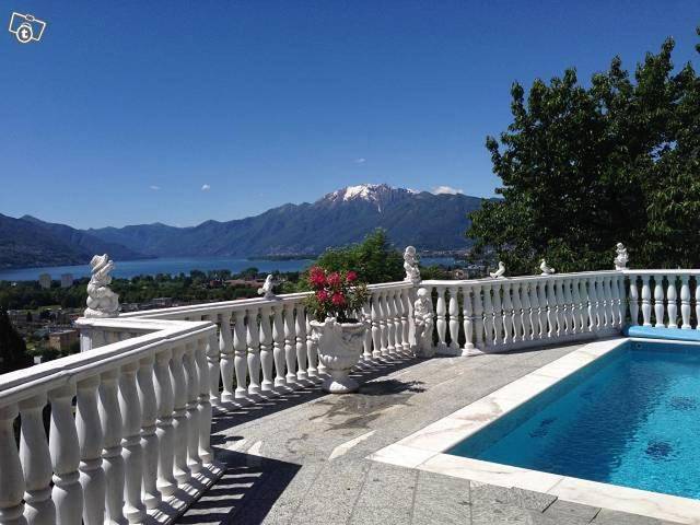 Ferienhaus Patrizia with a fantastic view of Lake Maggiore and the pool in Gordola, Tessiner Alpen