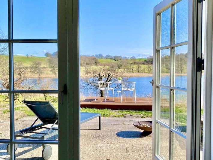 Ferienwohnung für 2 Personen, mit Terrasse und Seeblick sowie Ausblick und Garten - 1