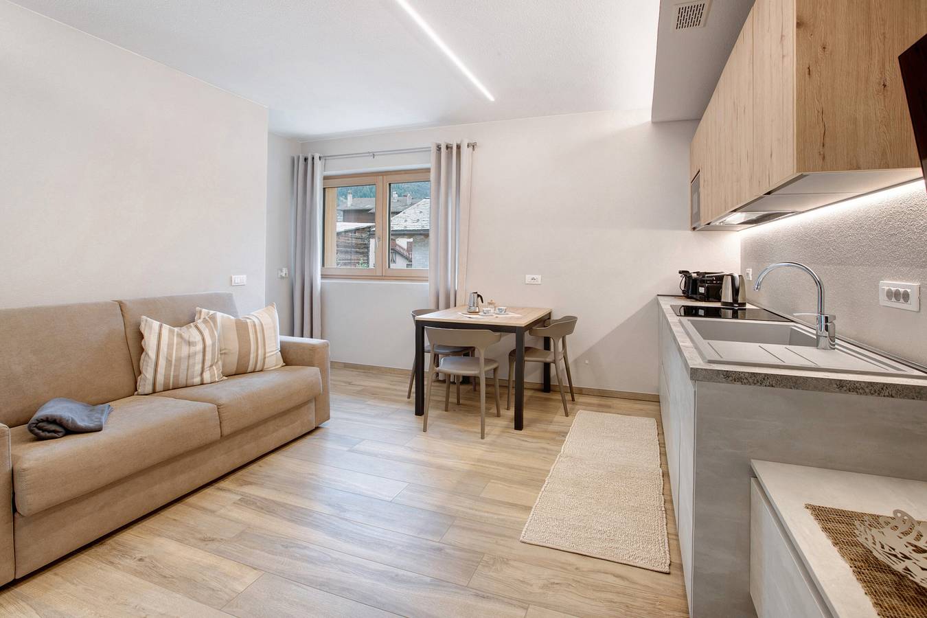 Ganze Wohnung, Ferienwohnung 'Soffio Livigno' mit Gemeinschaftsgarten, Balkon und Wi-Fi in Livigno, Veltlin