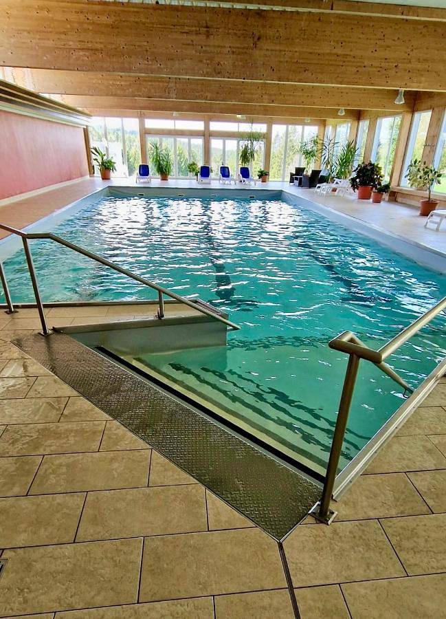 Ferienwohnung für 4 Personen, mit Balkon und Garten sowie Pool und Sauna