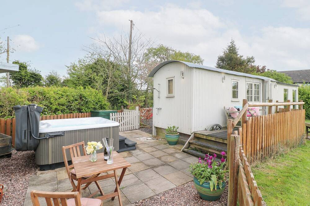 Shepherds Hut, pet friendly, with hot tub in Rugeley in Staffordshire