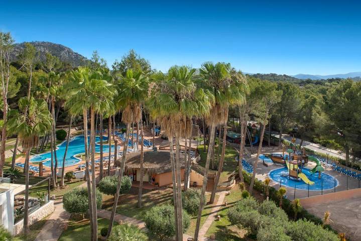 Apartamento para 4 personas, con piscina además de sauna y jardín, Familias con niños en Peguera