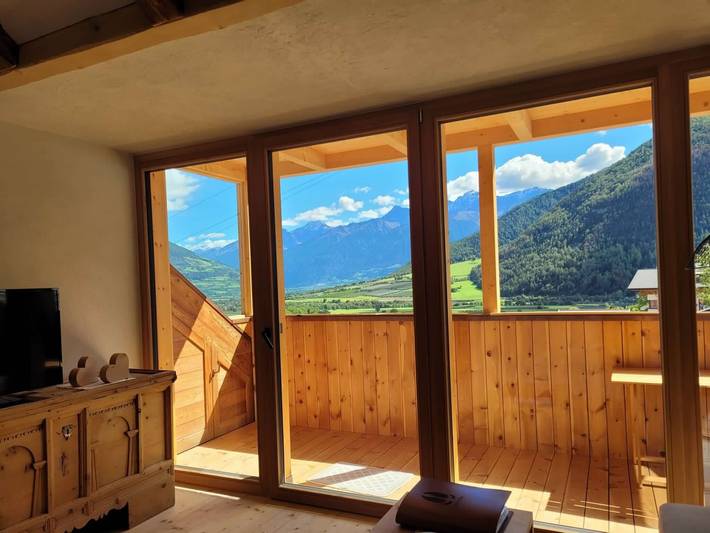 Appartement entier, Appartement "Hoamisch" avec vue sur les montagnes, jardin privé et Wi-Fi in Laudes, Mals