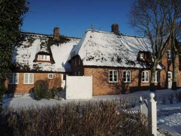 Ferienwohnung für 3 Personen, mit Terrasse und Garten sowie Sauna und Ausblick, mit Haustier in Alkersum