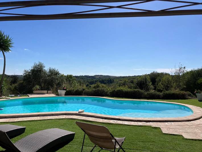 Location de vacances pour 9 personnes, avec piscine ainsi que vue et jardin à Autignac - 3