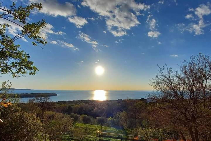 Ferienhaus mit Meerblick für 4 Personen, mit Balkon und Terrasse sowie Garten und Ausblick