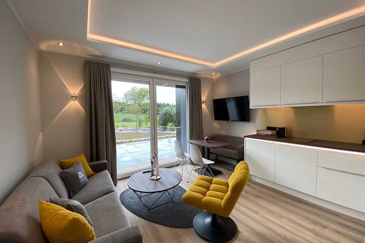 Ferienwohnung für 4 Personen, mit Terrasse und Garten sowie Sauna