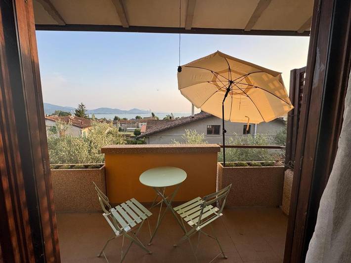 Ferienwohnung für 4 Personen, mit Terrasse und Garten sowie Ausblick und Seeblick in San Feliciano