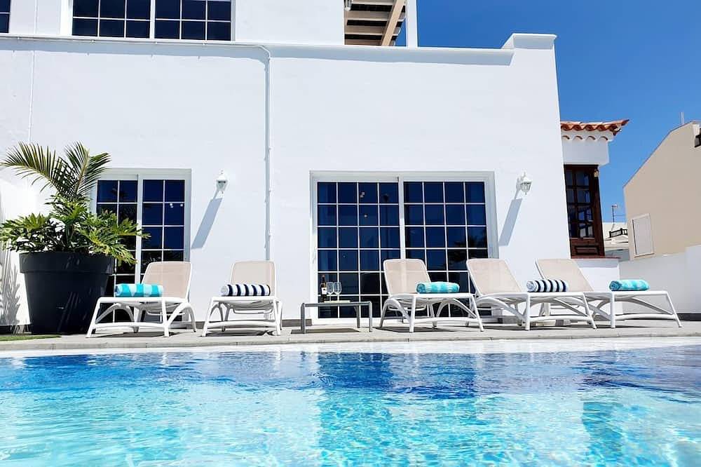 Bright and airy spacious three bedroom Holiday Home with private pool in La Caleta, Adeje