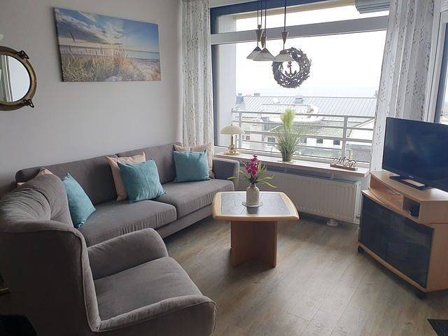 Ganze Wohnung, Moderne Ferienwohnung mit Meerblick und überdachtem Balkon direkt in Grömitz an der Seebrücke. in Grömitz, Ostholstein