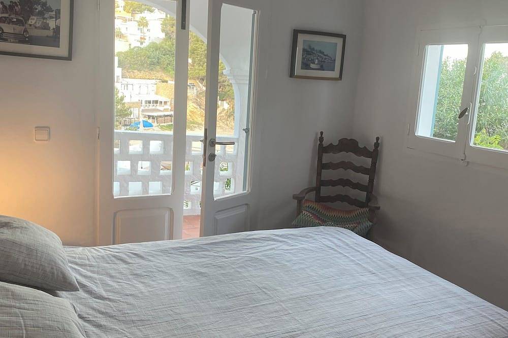Encantadora casa con vista al mar-Cerca de la playa-Ideal para parejas o familia in Cala Vedella, Sant Josep de sa Talaia