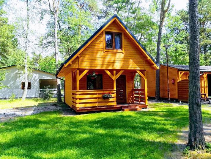Lodge für 2 Personen, mit Terrasse und Ausblick in Pogorzelica