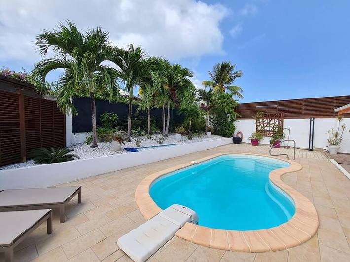 Location de vacances pour 6 personnes, avec jardin ainsi que terrasse et piscine dans Anse Tarare