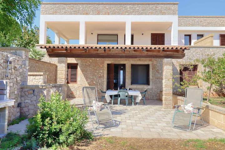 Casa vacanza per 5 persone, con Terrazza e Giardino a Patù