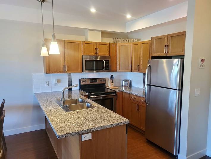 Vacation rental for 4 people, with balcony and sauna as well as pool and hot tub in West Kelowna