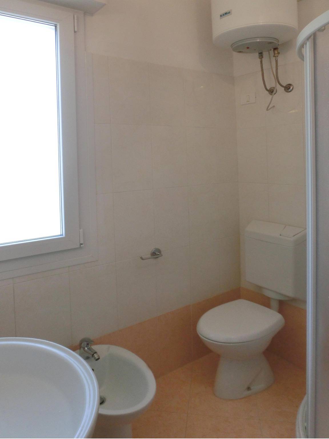 Gemütliche Villa: Strandnähe, AC, Parkplatz & Garten in Lignano Sabbiadoro, Udine Provinz
