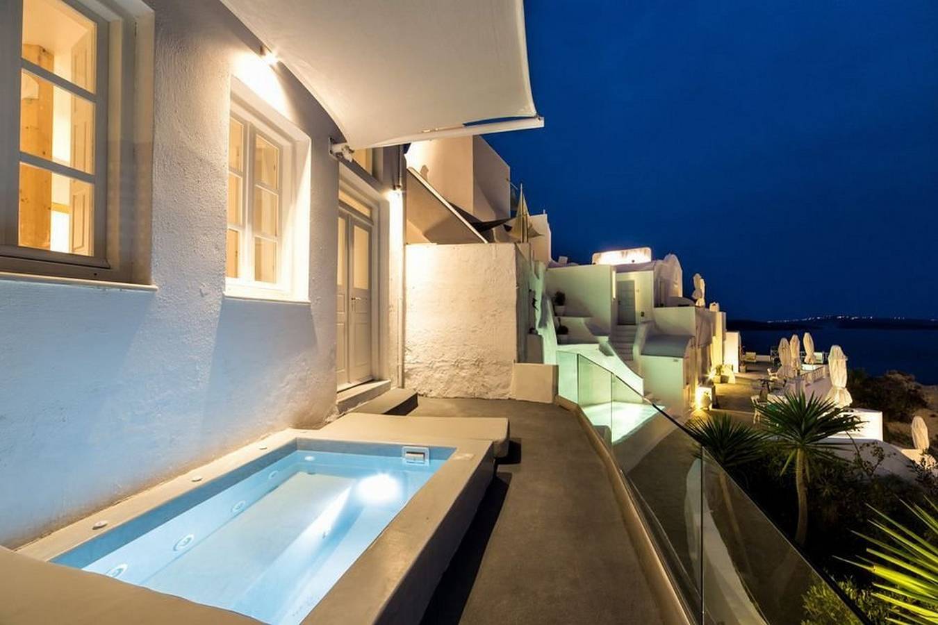 Charming Santorini Suite | Yagos Suite | 1 Bedroom | Min. Children Age: 12 Years | Private Furnished Balcony with Hot Tub Overlooking the Sea | Spacious Shared Sun Terrace and Swimming Pool with Breathtaking Caldera View | Oia in Oia, Santorin
