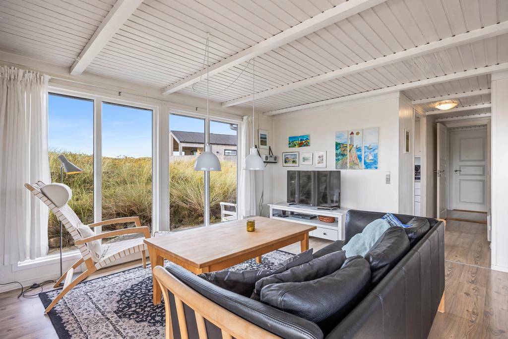 Ferienhaus mitten in den Dünen mit Panoramaaussicht in Bjerregård, Holmsland Klit