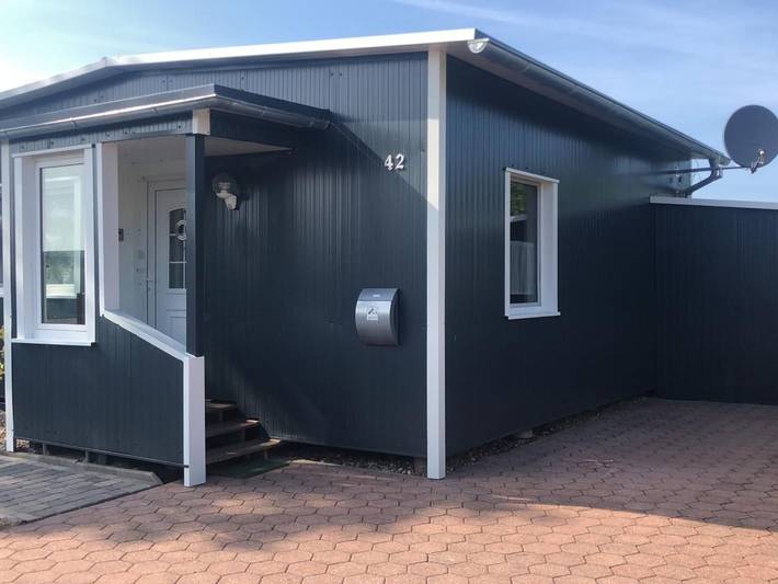 Ferienhaus für 6 Personen, mit Terrasse und Whirlpool sowie Garten und Pool in Südbrookmerland