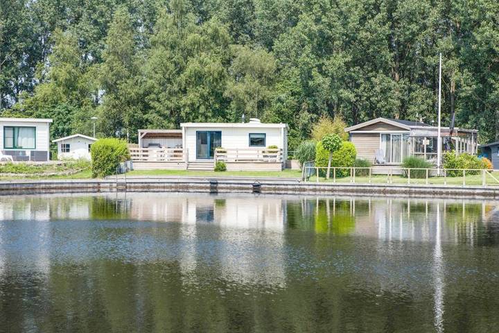 Ferienhaus für 7 Personen, mit Terrasse und Garten sowie Ausblick und Seeblick