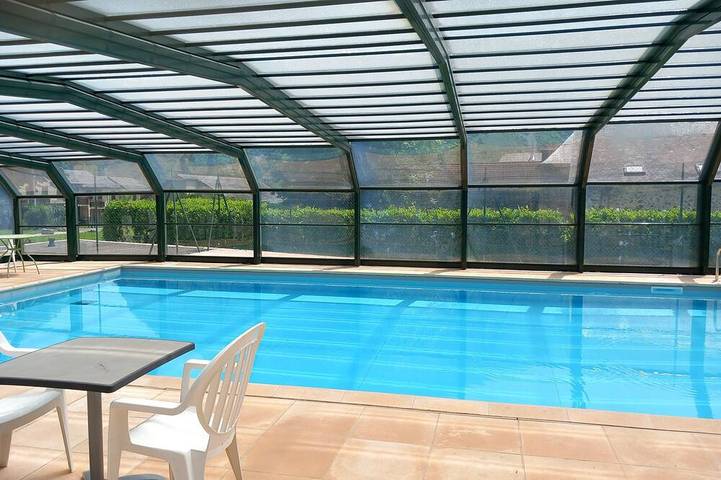 Appartement de vacances pour 4 personnes, avec Balcon ainsi que Jardin et Piscine