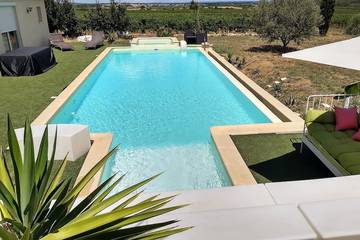 Location de vacances pour 14 personnes, avec jardin à Servian