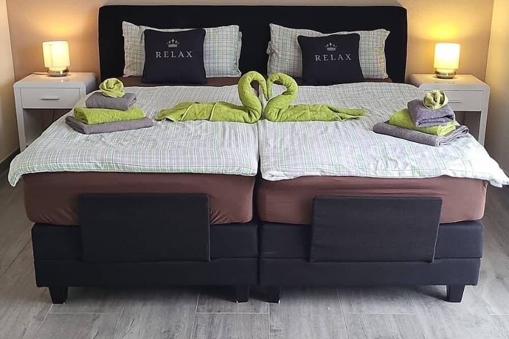 Ganze Wohnung, Familienfreundliche Ferienwohnung m. 2 Sz, Wintergarten, Wellness,Fahrrädern in Pewsum, Krummhörn