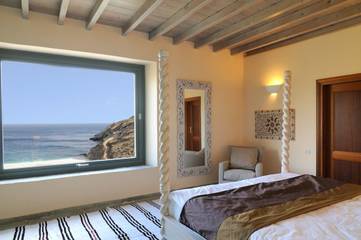 Cottage pour 2 personnes, avec terrasse et jardin ainsi que vue sur l’océan et piscine dans Andros