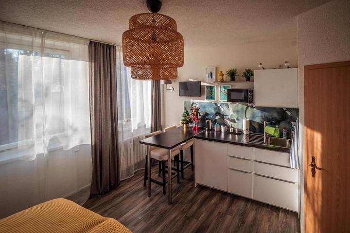 Ferienwohnung für 3 Personen, mit Terrasse und Garten sowie Ausblick