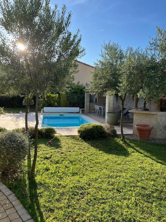 Appartement de vacances pour 4 personnes, avec jardin ainsi que piscine et vue, animaux acceptés