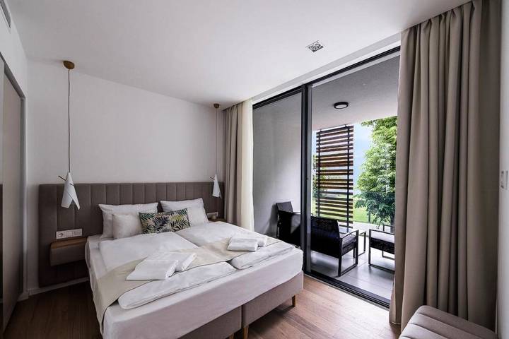 Apartmenthotel für 6 Personen, mit Garten und Seeblick sowie Sauna und Ausblick - 1