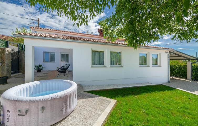 Ferienhaus für 4 Personen, mit Terrasse und Garten