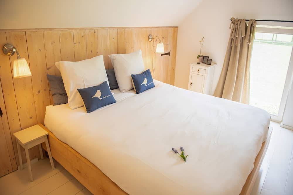 Idyllisch huisje met hottub, houtkachel en tuin in Lage Mierde, Noord-Brabant