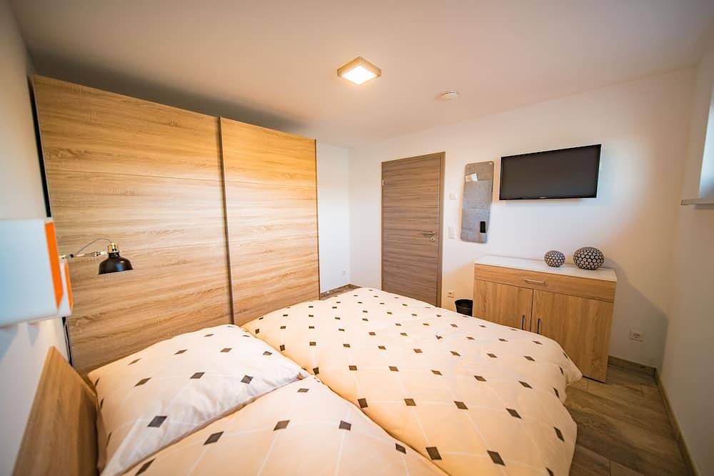 Ferienhaus am See mit Privatstrand, Sauna, Kamin, nahe Leipzig in Löbnitz, Nordsachsen