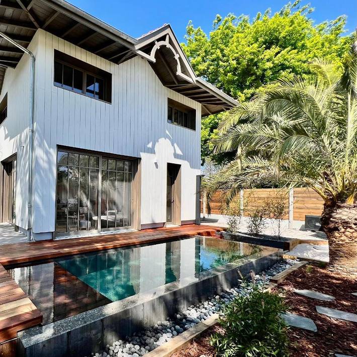 Maison de vacances pour 8 personnes, avec Jacuzzi et Terrasse ainsi que Jardin et Piscine dans Cazaux