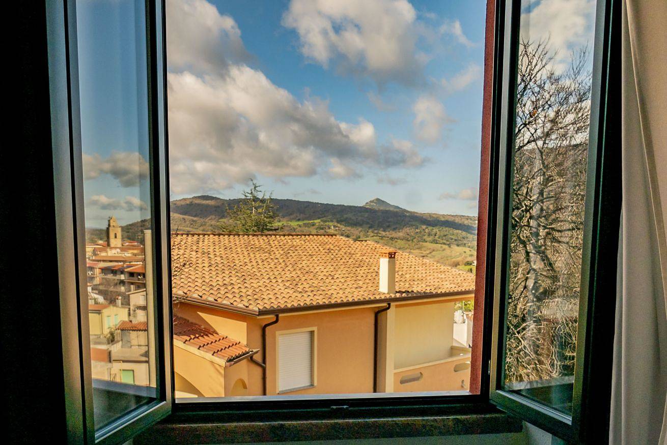 Appartamento intero, Le rose di Santina - Camera matrimoniale  in Mamoiada, Barbagia
