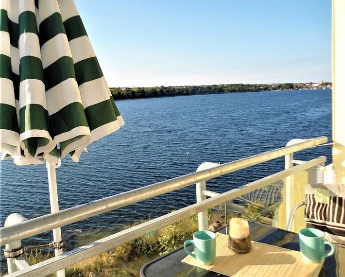 Ferienwohnung für 4 Personen, mit Garten und Seeblick am Steinwarder