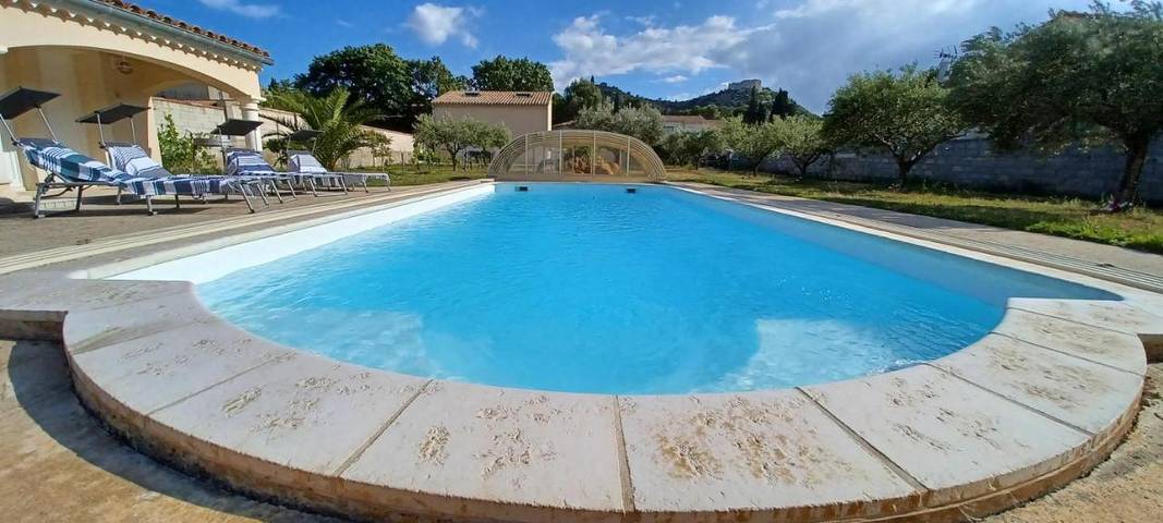 Appartement de vacances pour 5 personnes, avec vue ainsi que jardin et piscine