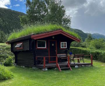 Bungalow für 4 Personen, mit Seeblick und Garten sowie Ausblick in Norwegen