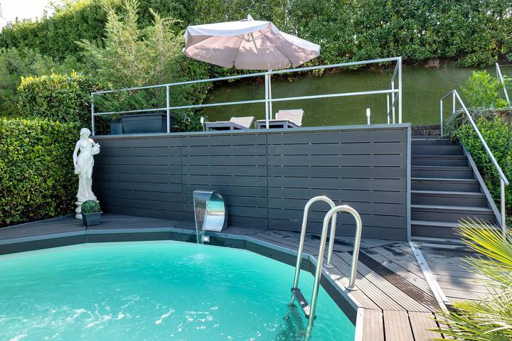 Ferienwohnung für 2 Personen, mit Balkon und Garten sowie Seeblick