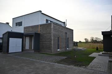 Ferienhaus für 4 Personen, mit Sauna und Balkon sowie Garten, kinderfreundlich in Butjadingen